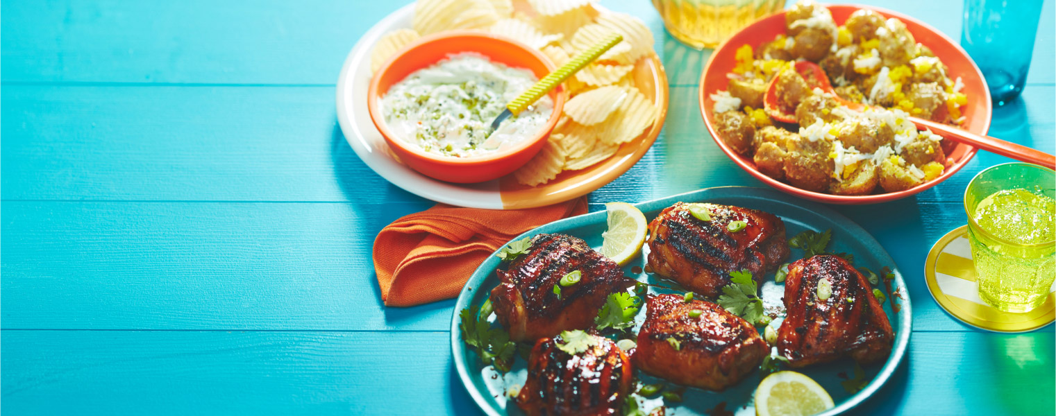 Aqua tabletop with three ways to use condiments - chips and dip, chicken glaze, and potato salad