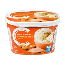 Tub of butterscotch ice cream on orange background