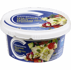 A tub of Compliments Feta Cheese
